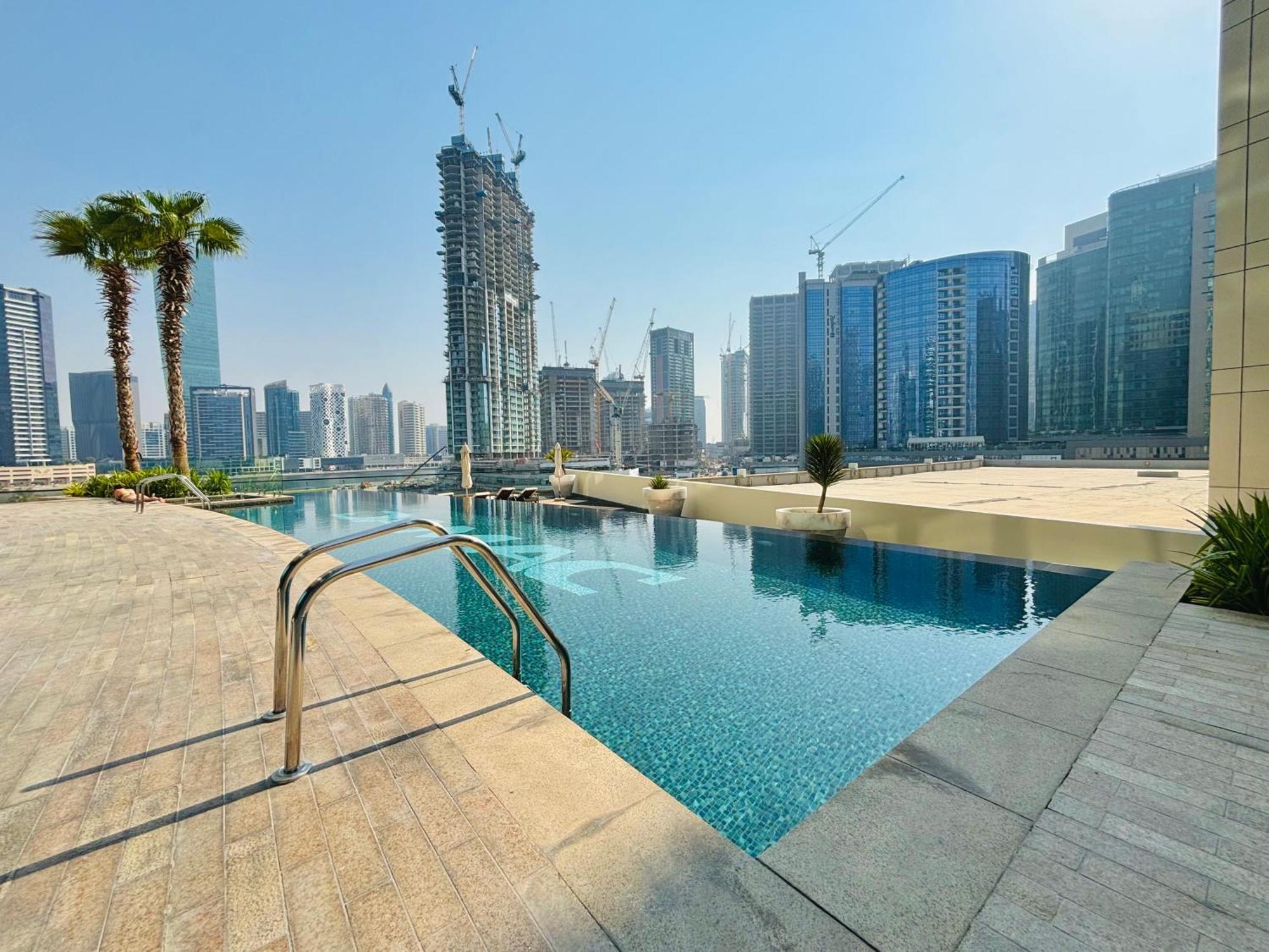 Appartement Stunning With Infinity Pool , Canal View , Gym & Free Parking